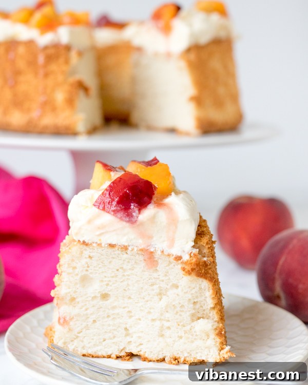 Rustic Angel Food Cake Close-up of a rustic slice of Angel Food Cake, showcasing its natural texture.