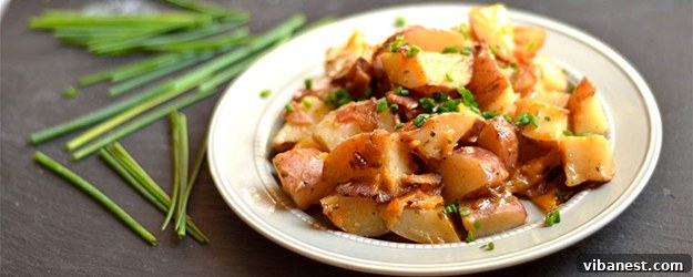 Delicious Slow Cooker Cheddar Bacon Ranch Potatoes in a serving dish, ready to eat.