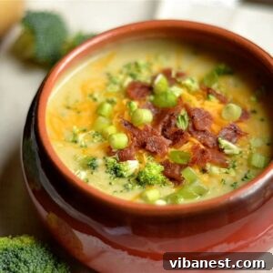 bowl of instant pot cheddar broccoli and potato soup