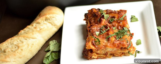 Delicious slow cooker lasagna with layers of meat sauce, cheese, and noodles