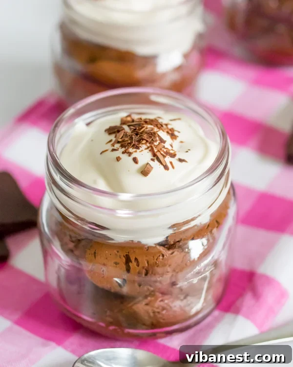 chocolate-mousse-whipped-cream-2.jpg Close-up of chocolate mousse in a glass, showing its smooth, creamy texture