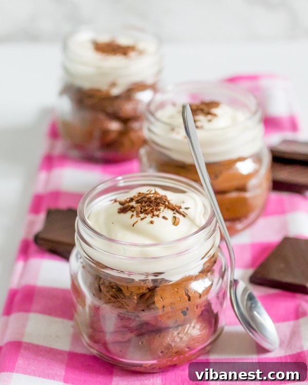 chocolate-mousse-whipped-cream-3.jpg The process of piping chocolate mousse into a glass for neat presentation