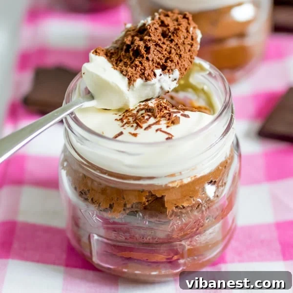 A beautifully presented bowl of chocolate mousse with all ingredients ready