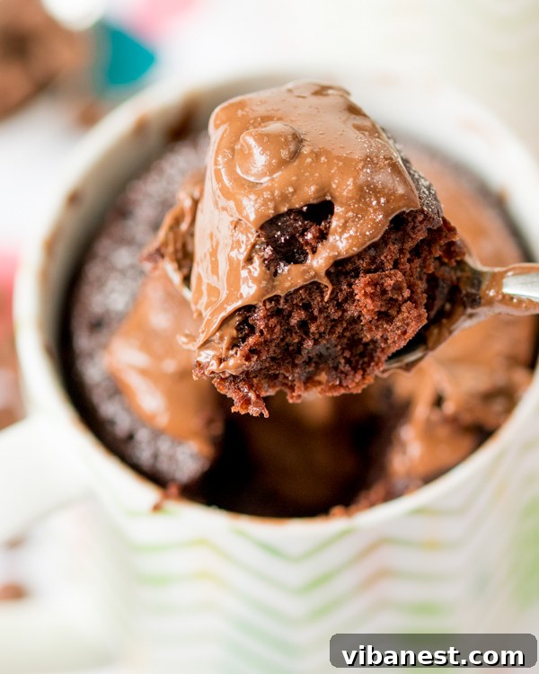 nutella-mug-cake-3.jpg Ready-to-eat Nutella Mug Cake with melted Nutella