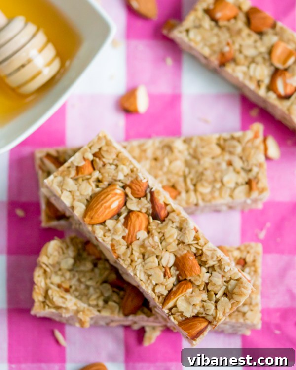 Preparing Homemade Granola Bar Mixture No-bake granola bar ingredients mixing in a bowl
