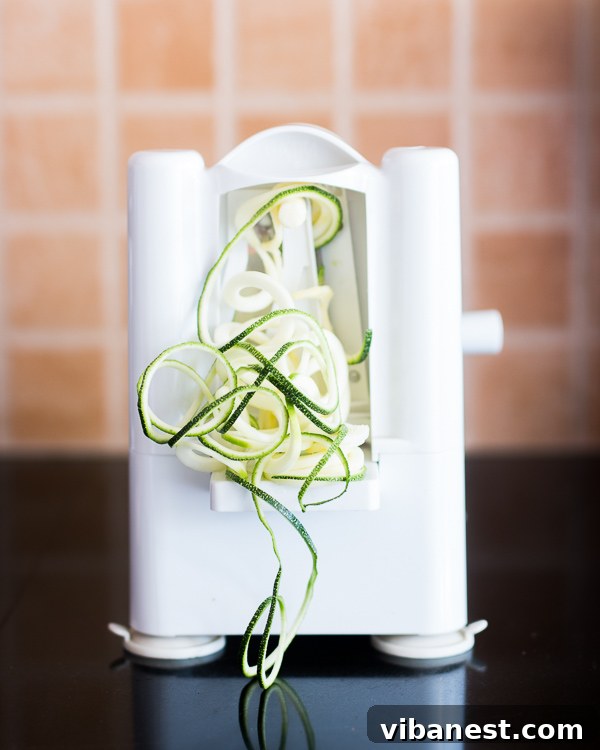 Fresh Zucchini Noodles Ready for Cooking Freshly made zucchini noodles in a bowl