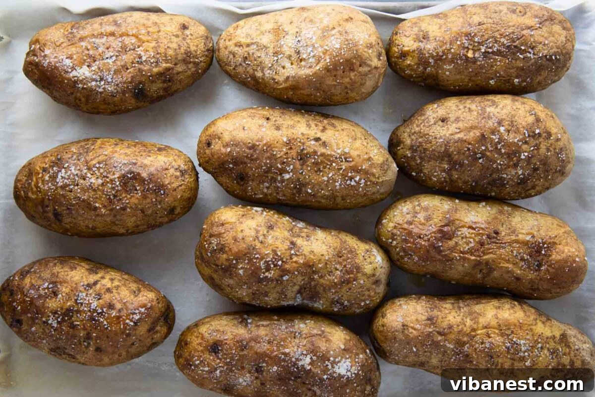 Mastering the Art of Baked Potatoes 4 Visual guide showing how long to cook a baked potato at 400 degrees Fahrenheit, emphasizing the importance of fork-tenderness.