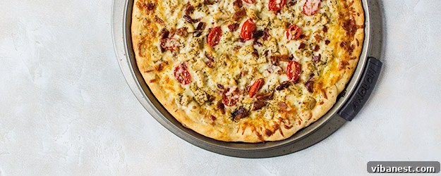 Delicious homemade Chicken Bacon Ranch Pizza with a crispy crust and vibrant toppings
