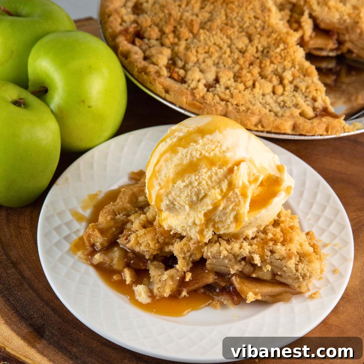 Golden Apple Streusel Pie 4 Unbaked apple pie with crumb topping, ready to go into the oven