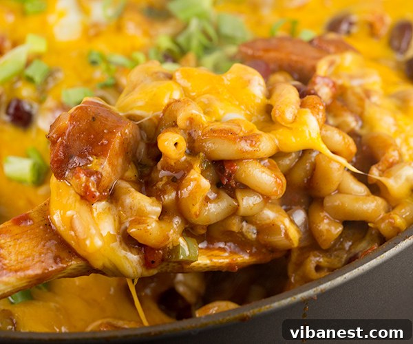 one-pot-spicy-chili-mac-3.jpg Serving of One Pot Spicy Chili Mac with toppings
