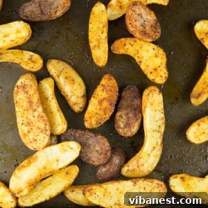 Crispy Oven Roasted Fingerling Potatoes 2 Easy Oven Roasted Fingerling Potatoes on a baking sheet