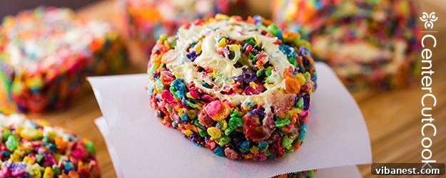 Vibrant Rainbow Rice Krispie Pinwheels arranged beautifully on a serving platter