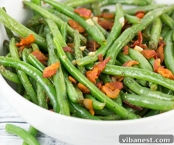 how-to-make-green-beans-4.jpg Bowl of blanched green beans ready for shocking in an ice bath