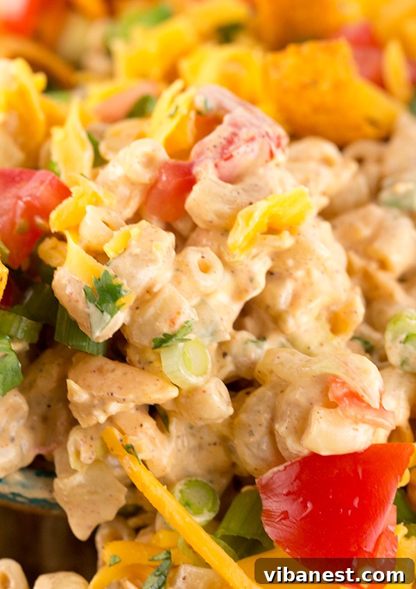taco-macaroni-salad-4.jpg Taco Macaroni Salad with vibrant toppings