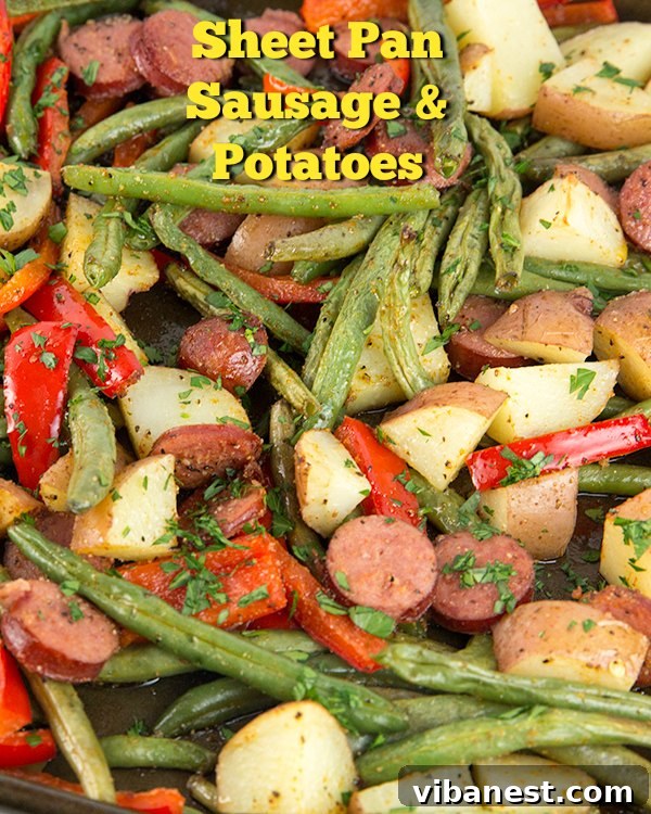 one-pan-sausage-potatoes-4.jpg Close-up of roasted one-pan sausage and potatoes with green beans and bell peppers