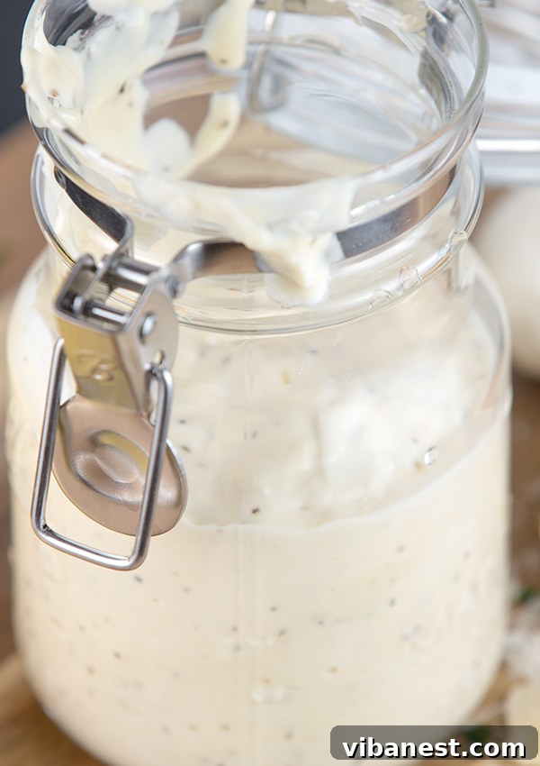 caesar-dressing-ingredients.jpg Ingredients for Caesar dressing being combined in a jar