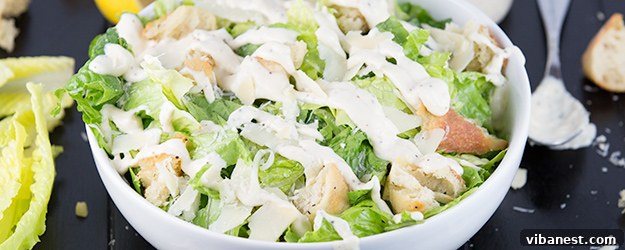 restaurant-quality-caesar-salad.jpg Full Caesar salad with dressing, croutons, and Parmesan