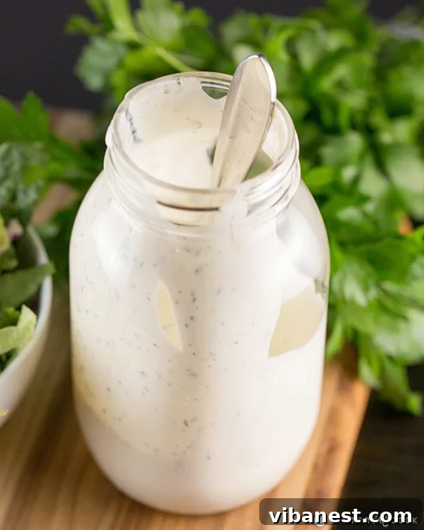 Fresh Salad with Homemade Ranch Fresh garden salad with vibrant vegetables and a generous drizzle of homemade ranch dressing