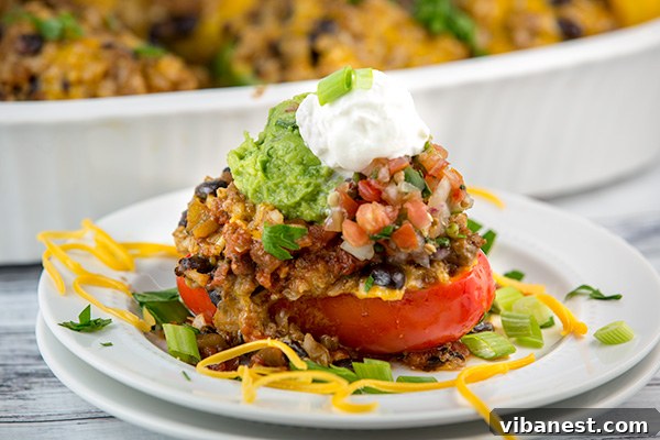 mexican-stuffed-peppers-3.jpg Close-up of the delicious filling inside Mexican Stuffed Peppers before baking