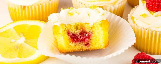 Zesty Lemon Cupcakes with Sweet Raspberry Jam Filling