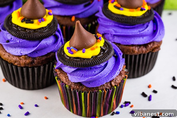 Halloween Treat: Witch Hat Cupcakes - Single Serve A single Witch Hat Cupcake on a white tray, ready to be served