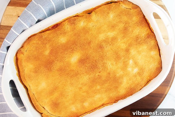 Baked Pepperoni Pizza Casserole Baked pepperoni pizza casserole with golden crescent roll crust