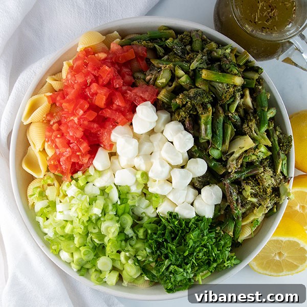 roasted-vegetable-pasta-salad-7.jpg Ingredients for pasta salad dressing in a glass jar