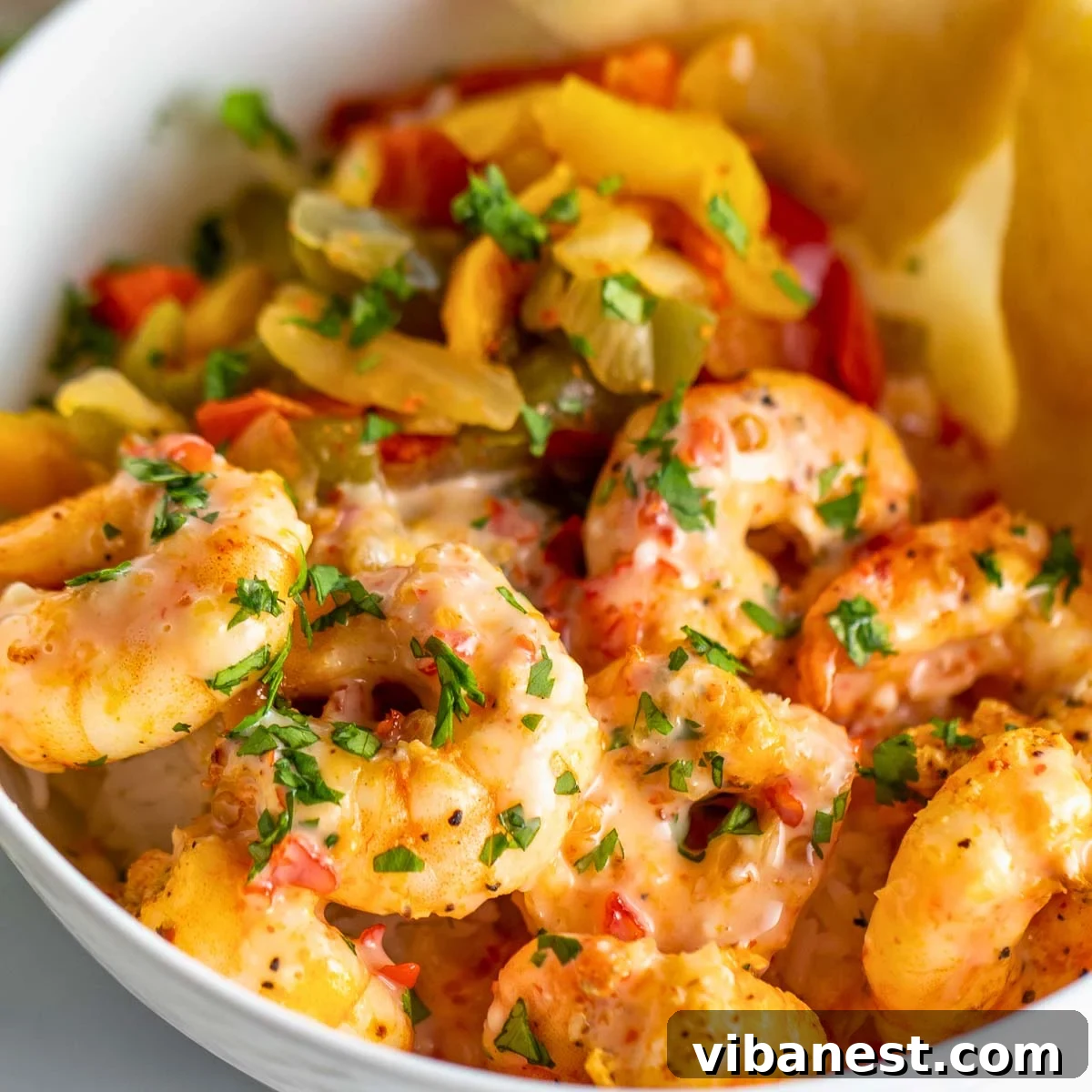 Sweet Heat Air Fryer Shrimp 2 close up of air fryer shrimp coated with a sweet chili sauce