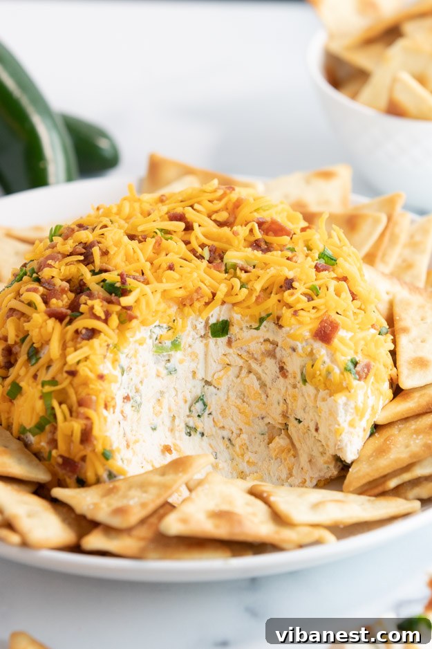 Jalapeno Bacon Cheese Ball Ready to Serve Delicious Jalapeño Bacon Cheese Ball served with crackers and celery