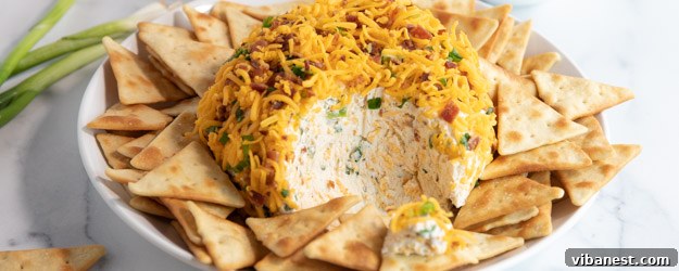 Gourmet Cheese Ball Close-up of a perfectly coated Jalapeño Bacon Cheese Ball, ready for serving