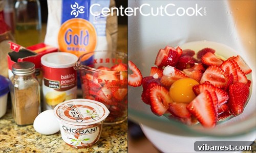 Mixing wet ingredients for strawberry yogurt muffins in a stand mixer.
