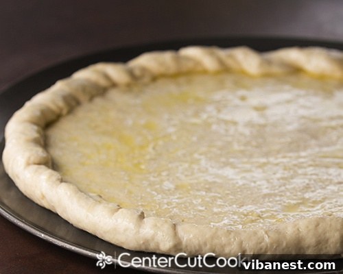 Crispy Pre-baked Pizza Crust Pre-baked pizza dough brushed with olive oil for a crispy crust