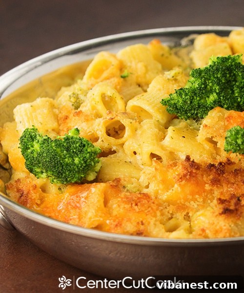 Creamy Four Cheese Rigatoni 5.jpg Close-up of baked Creamy Four Cheese Rigatoni skillet with melted cheese and crispy panko topping