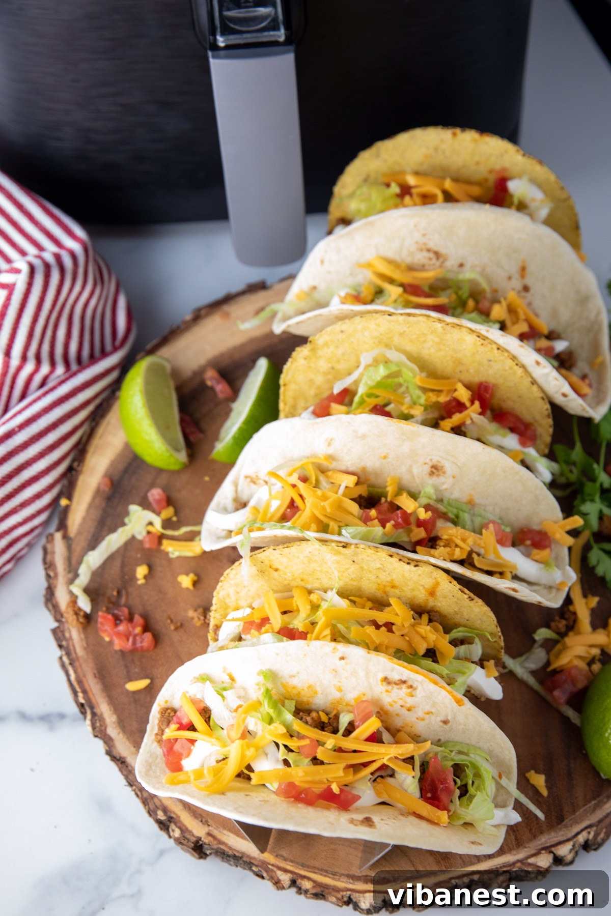 Air Fryer Taco Shells Perfectly Crispy 10 taco shells heated in air fryer with toppings