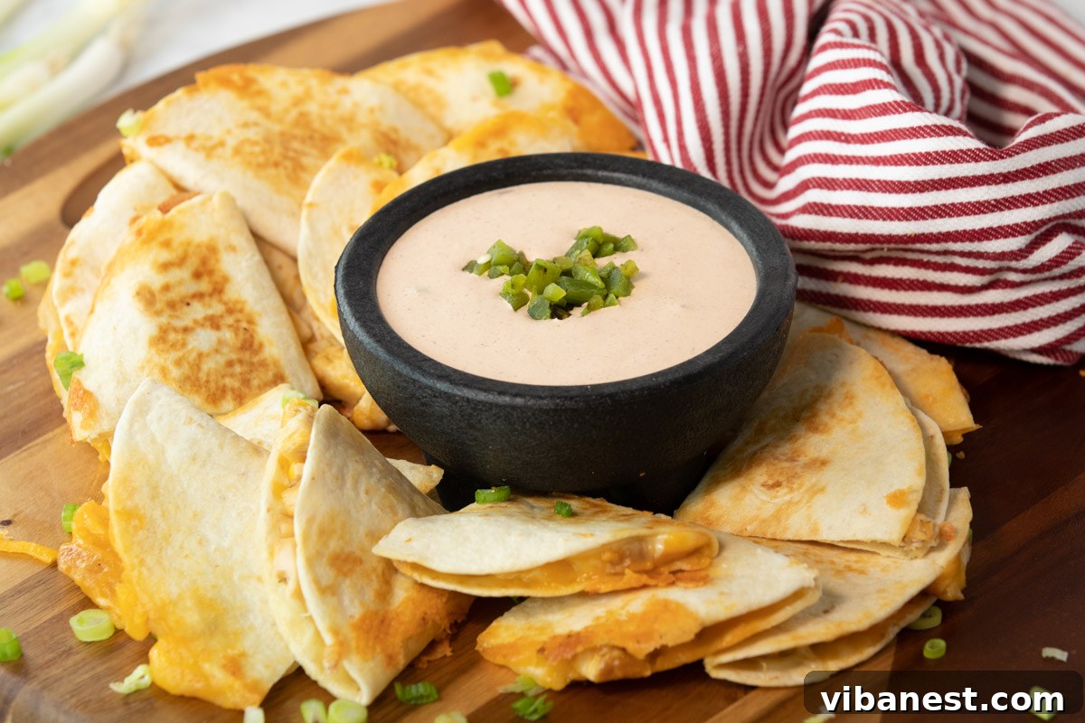 Taco Bell's Iconic Quesadilla Flavor 3 bowl of taco bell quesadilla sauce surrounded by a cut up a quesadilla