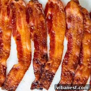 Crispy Oven Bacon Every Time 10 Crispy oven-baked bacon slices, a perfect breakfast side.