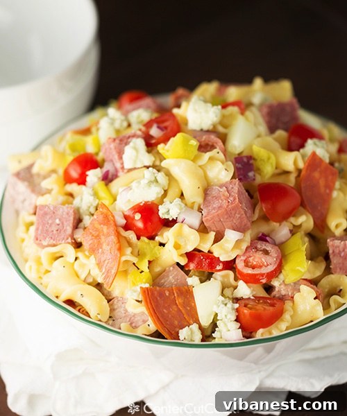 antipasto pasta salad 5.jpg Ingredients for Antipasto Pasta Salad dressing including olive oil, vinegar, and seasonings