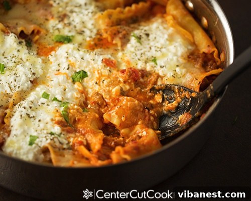 Spicy Skillet Lasagna Ready to Eat Close-up of Spicy Skillet Lasagna showing melted cheese and rich sauce.