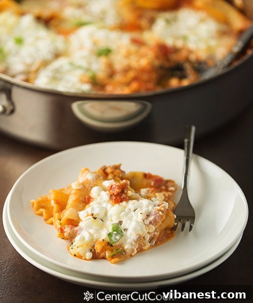 Skillet Lasagna in the Process of Cooking Overhead shot of Skillet Lasagna cooking, showing the layers of ingredients.