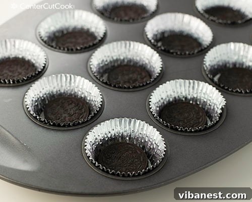 Chocolate Oreo Cupcakes Delicious Chocolate Oreo cupcakes with Cookies and Cream Frosting, beautifully arranged on a serving plate.