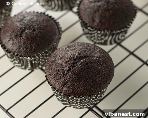 Cross-section of an Oreo cupcake A Chocolate Oreo cupcake cut in half, clearly showing the whole Oreo cookie baked into the bottom.