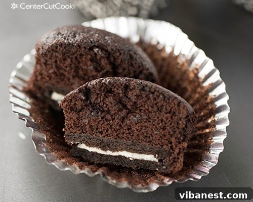 Frosted Oreo Cupcakes A batch of Chocolate Oreo cupcakes topped with generous swirls of Cookies and Cream Frosting.