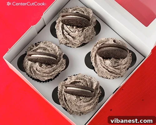 Final Oreo Cupcakes Presentation An array of finished Chocolate Oreo Cupcakes with Cookies and Cream Frosting and whole Oreo garnishes.