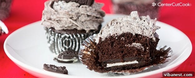 Garnished Oreo Cupcake A stunning close-up of a finished Chocolate Oreo Cupcake with a whole Oreo garnish.