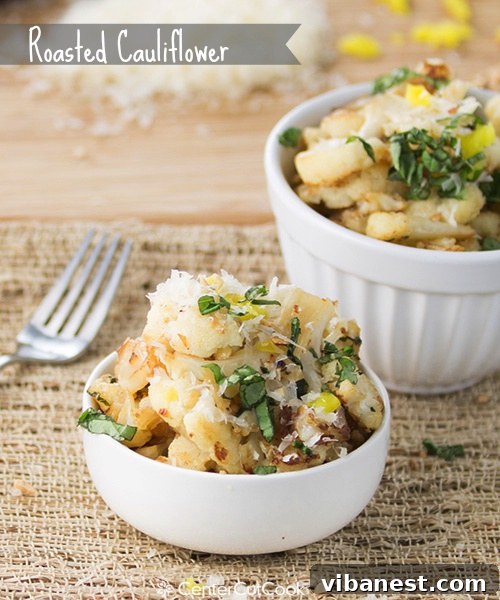 Plated Roasted Cauliflower garnished with basil and almonds