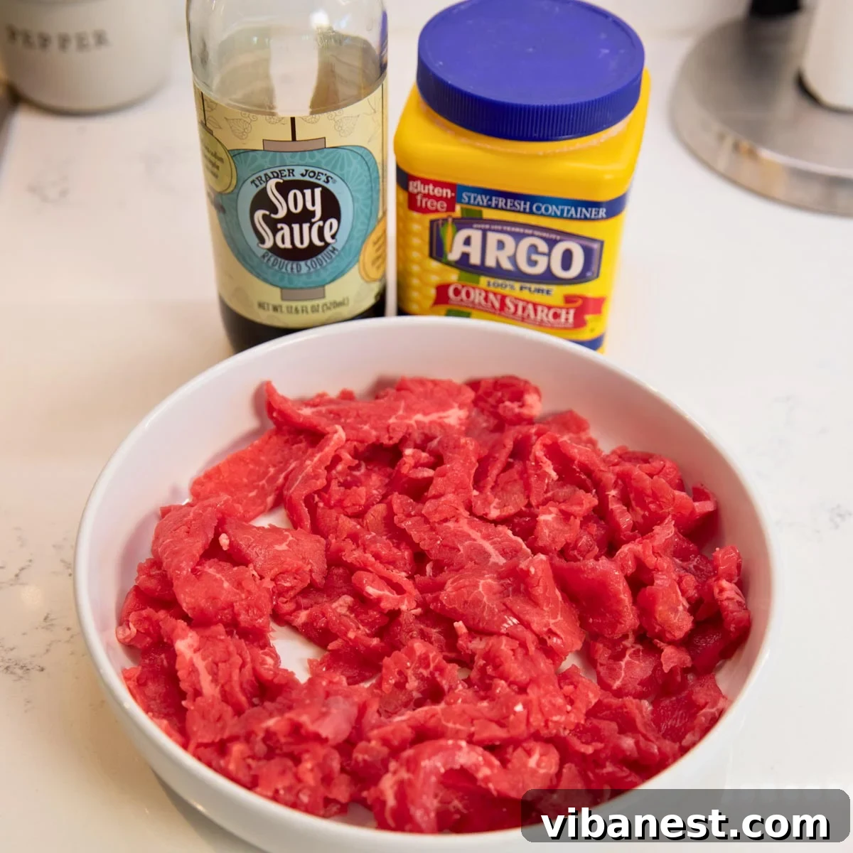 Sizzling Pepper Steak with Onions 3 Thinly sliced flank steak marinating in soy sauce and cornstarch