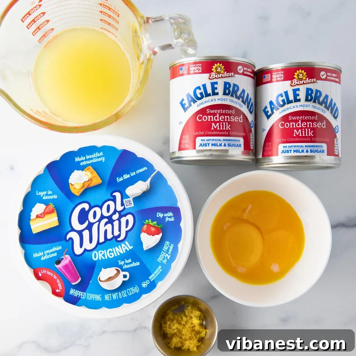 Sunshine Graham Delight 3 Fresh lemon pie ingredients including sweetened condensed milk, egg yolks, and fresh lemons