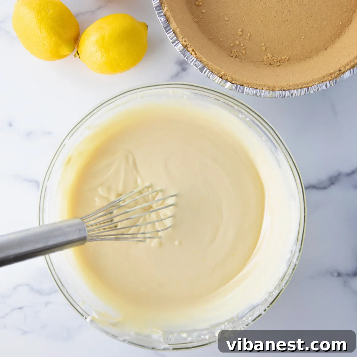 Sunshine Graham Delight 4 Close-up of lemon pie filling poured into a graham cracker crust