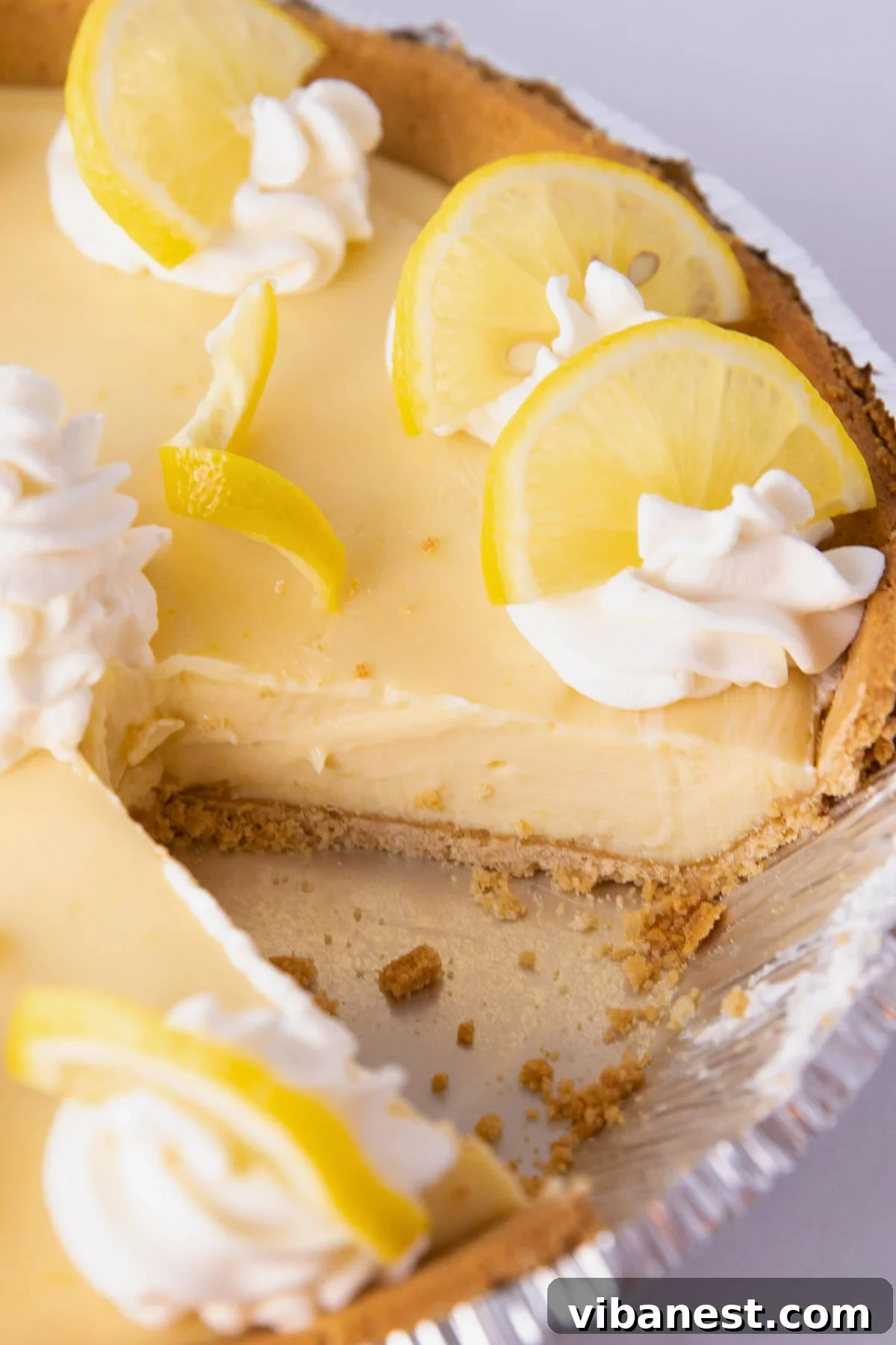 Sunshine Graham Delight 6 Full 4-ingredient lemon pie with graham cracker crust on a white plate