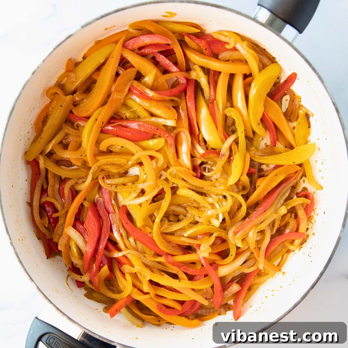 Sizzling Fajita Vegetables 2 overhead of skillet of fajita veggies